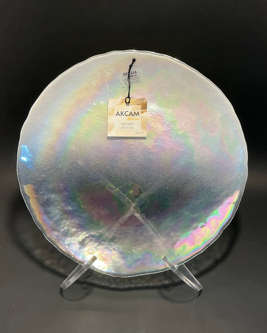 Akcam Iridescent Dinner plate 10” which is handmade in Turkey with their shimmering opal-like finish that changes color with light.
