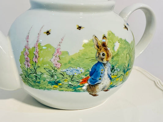 Beatrix Potter Peter Rabbit by Zrike Ceramic Teapot from “ In the Garden “ holds 4 cups , approximately 5.5” H, the world of Beatrix potter check my Peter rabbits collection of collectible items