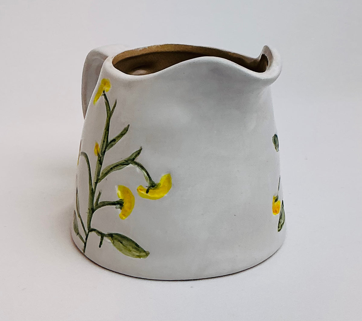 Potter’s Studio hand-painted creamer in Blue OR Yellow