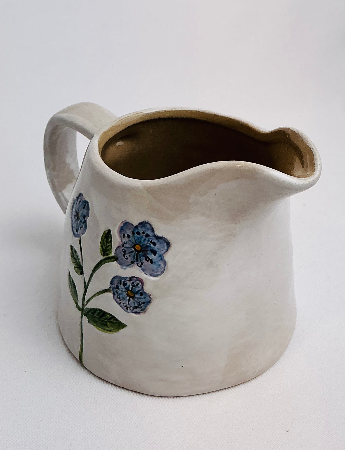 Potter’s Studio hand-painted creamer in Blue OR Yellow
