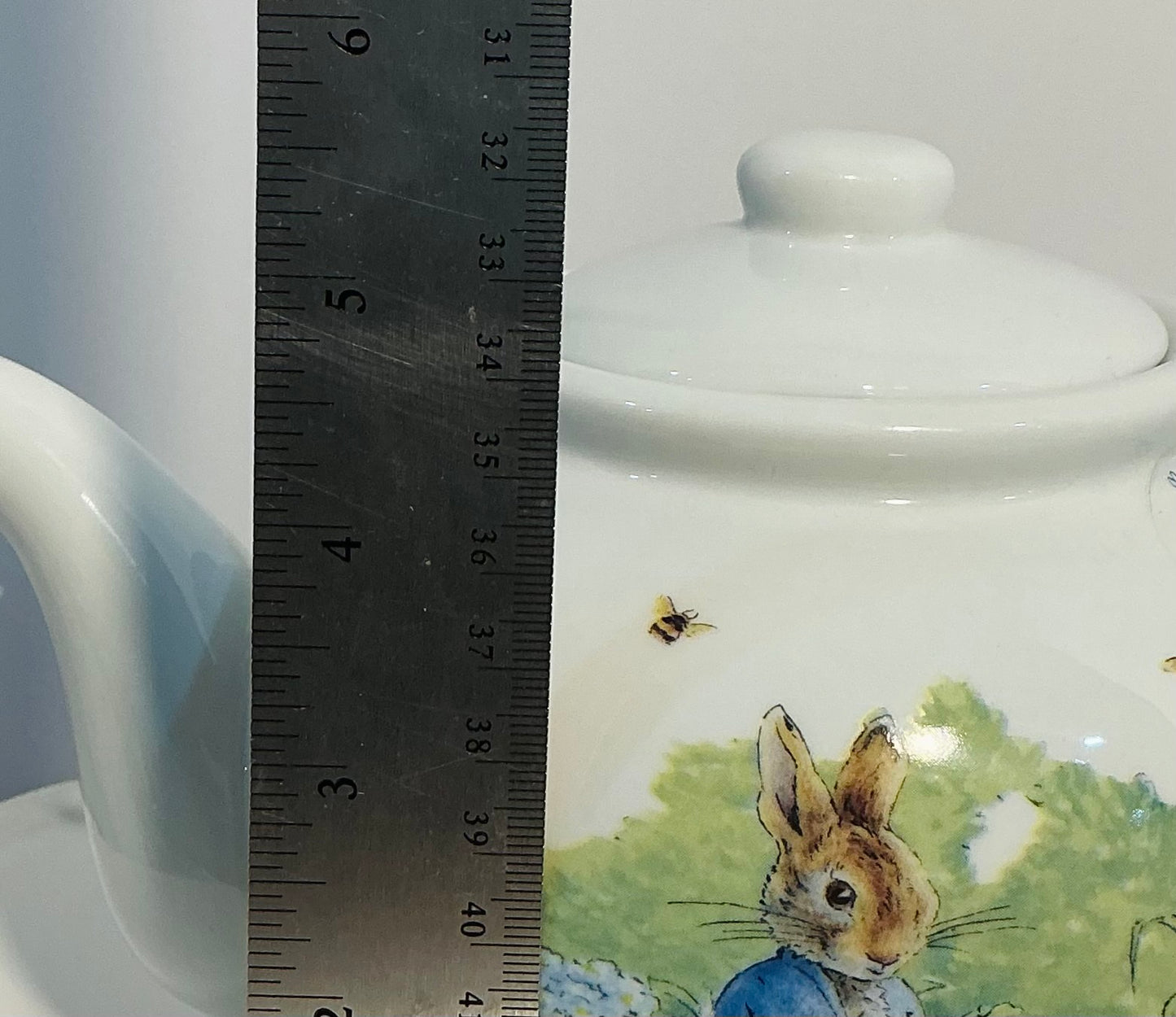 Beatrix Potter Peter Rabbit by Zrike Ceramic Teapot from “ In the Garden “ holds 4 cups , approximately 5.5” H, the world of Beatrix potter check my Peter rabbits collection of collectible items