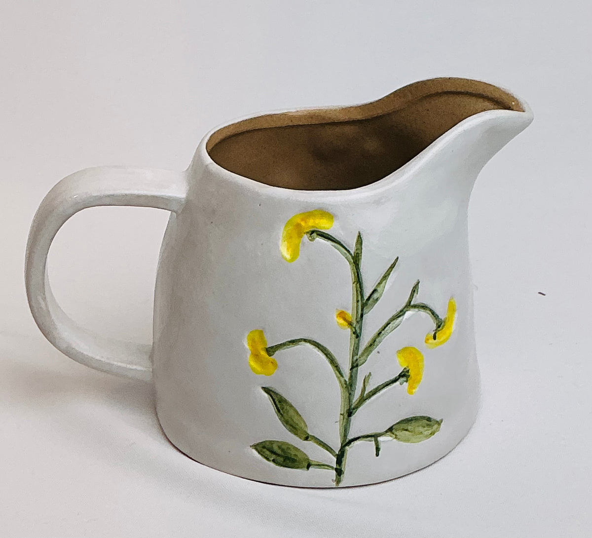 Potter’s Studio hand-painted creamer in Blue OR Yellow