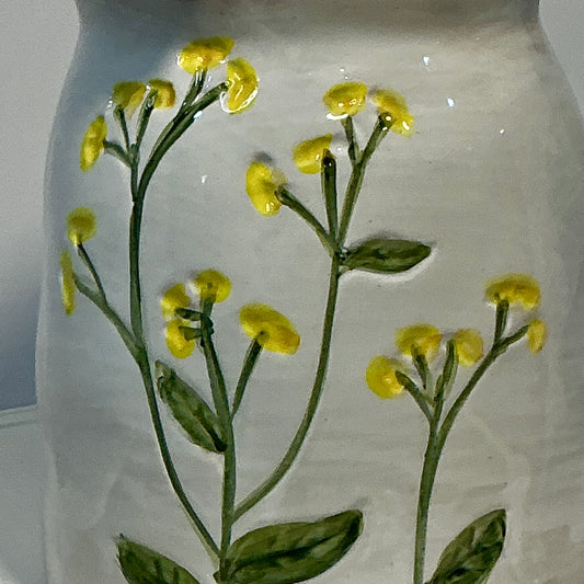 Potter’s Studio artisan collection stoneware storage jar, featuring hand-painted yellow flowers 7”