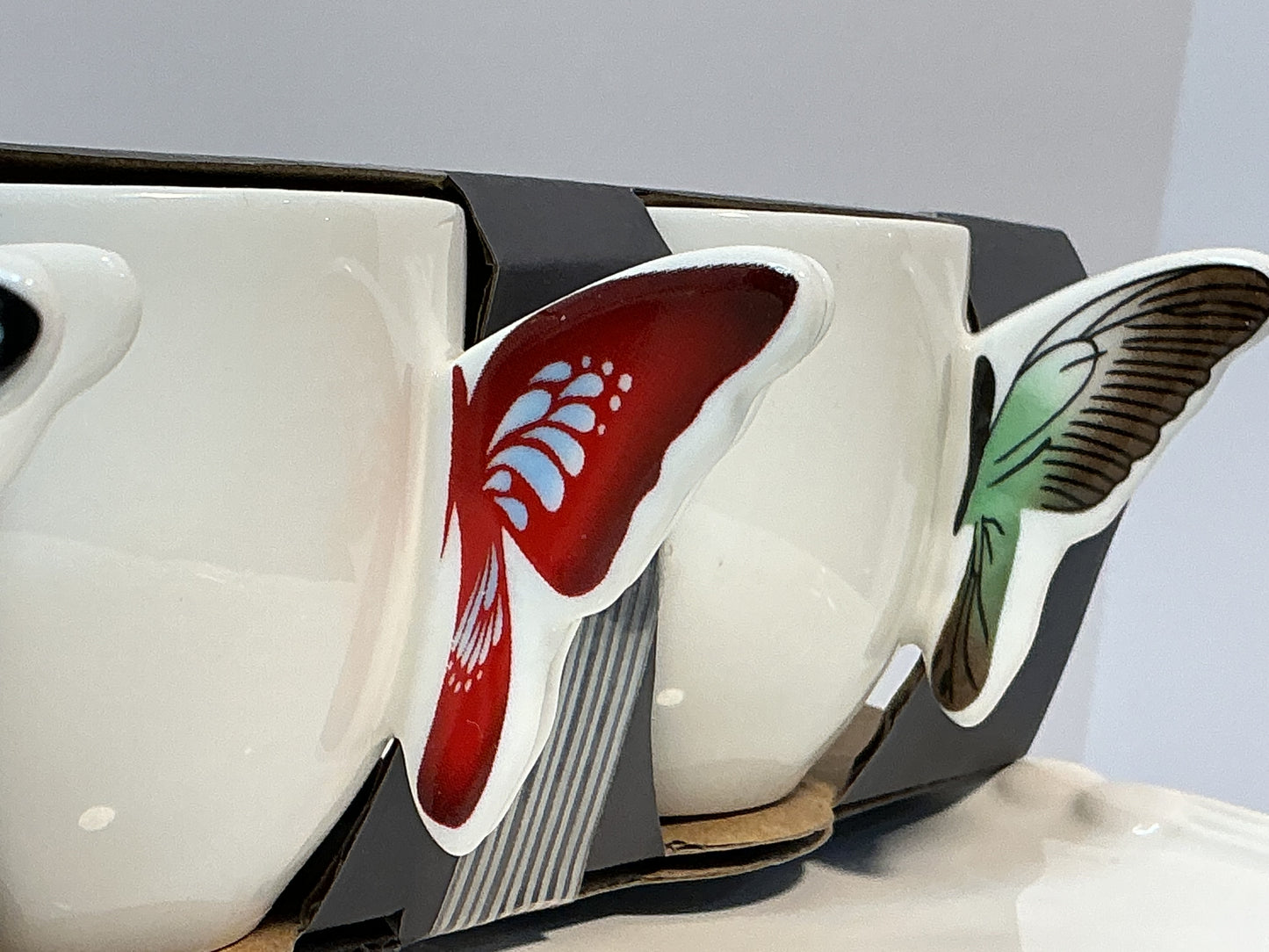 Set of 4 espresso coffee cups w/ Butterfly handle design