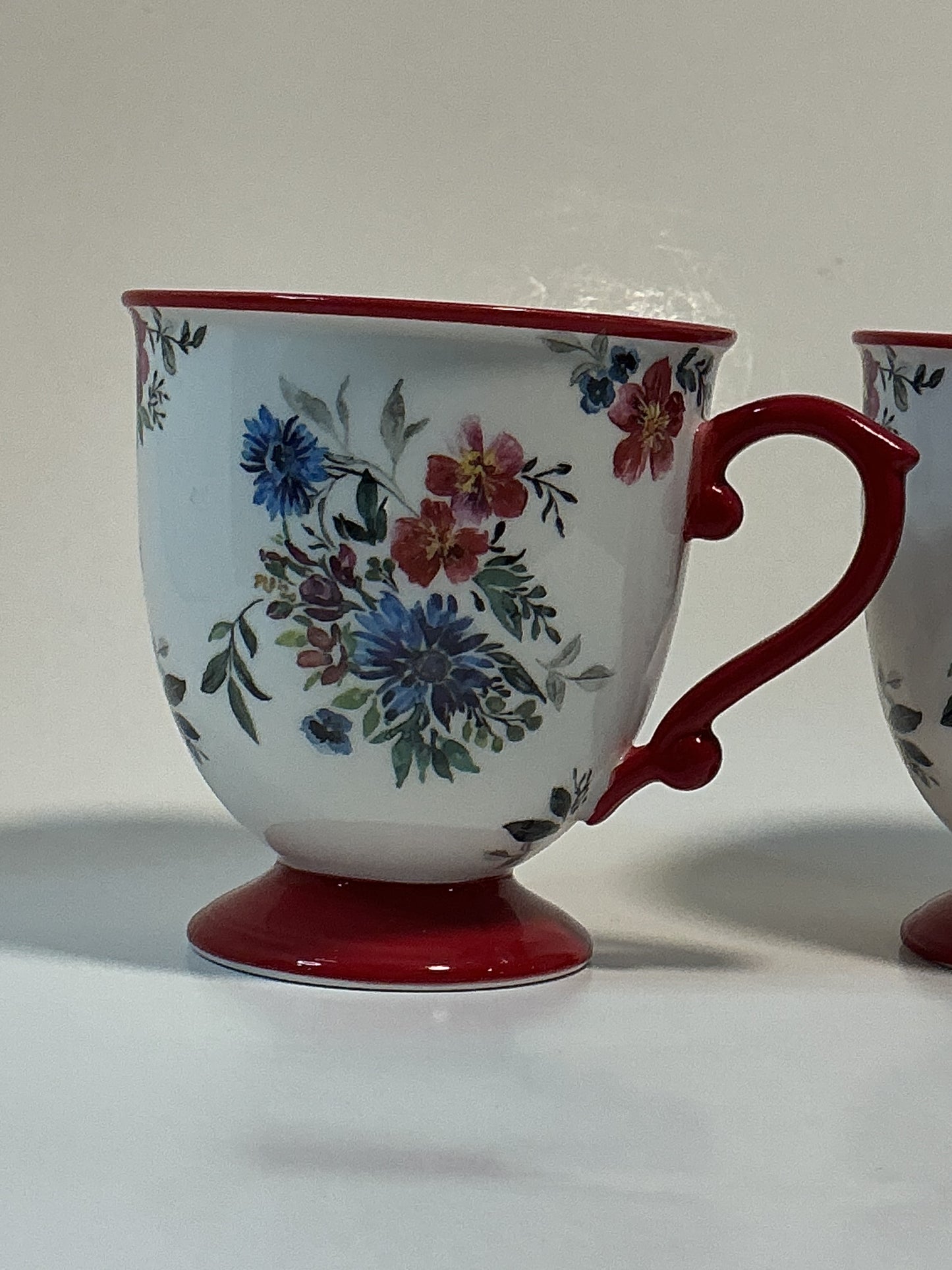 Grace’s Teaware Set of 2 coffee/tea mugs with a red pedestal floral design