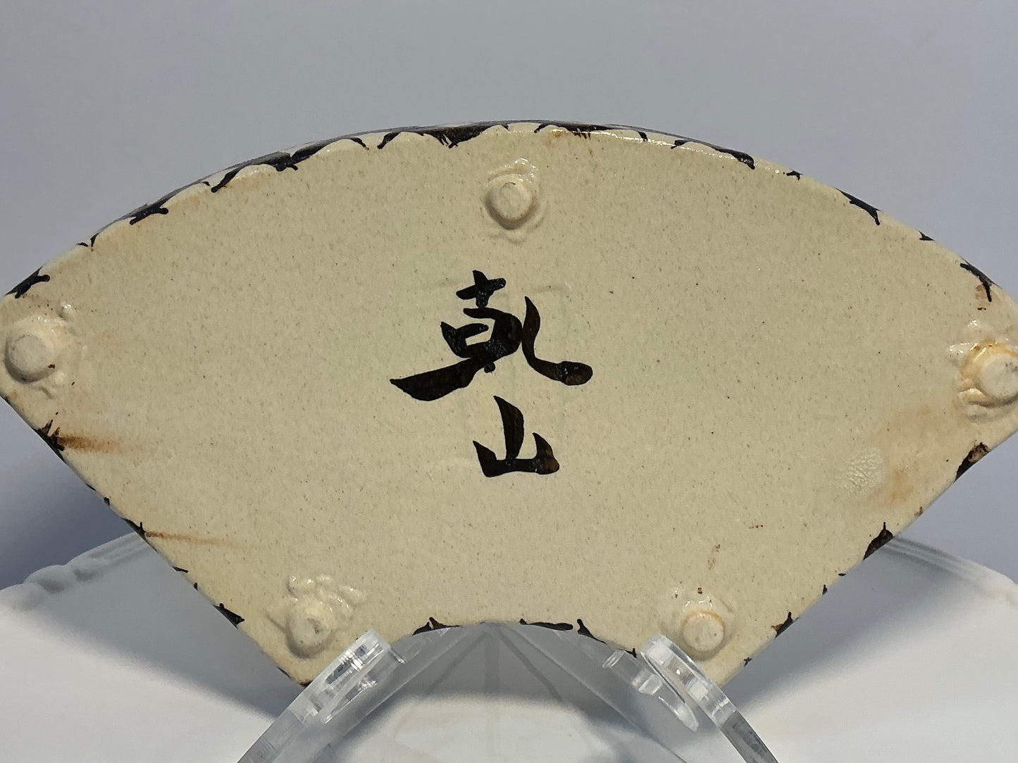 Vintage Japanese Kenzan-Ware Fan-Shaped Dish- Signed Ogata Kenzan Style, hand painted “Kenya”style mark on the base a tribute to the legendary 18th century master ogata kenzan. Traditional Kyoto-ware(kyo-yaki) characterized by its creamy crackle glaze han