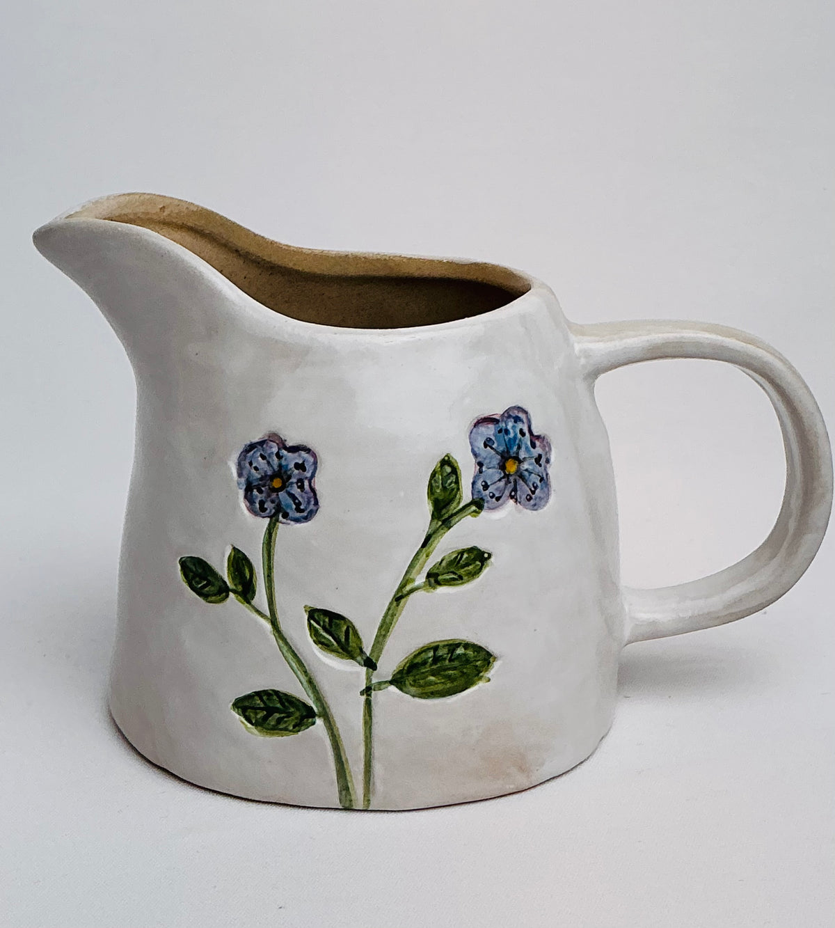 Potter’s Studio hand-painted creamer in Blue OR Yellow
