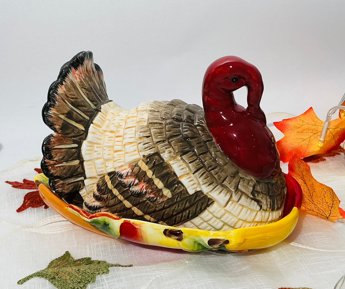 Heritage Harvest turkey-themed tableware with autumn colors